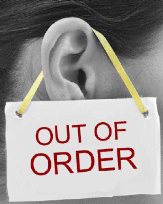 Out of order sign hanging on an ear